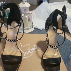 gently used choka christian louboutin blk..